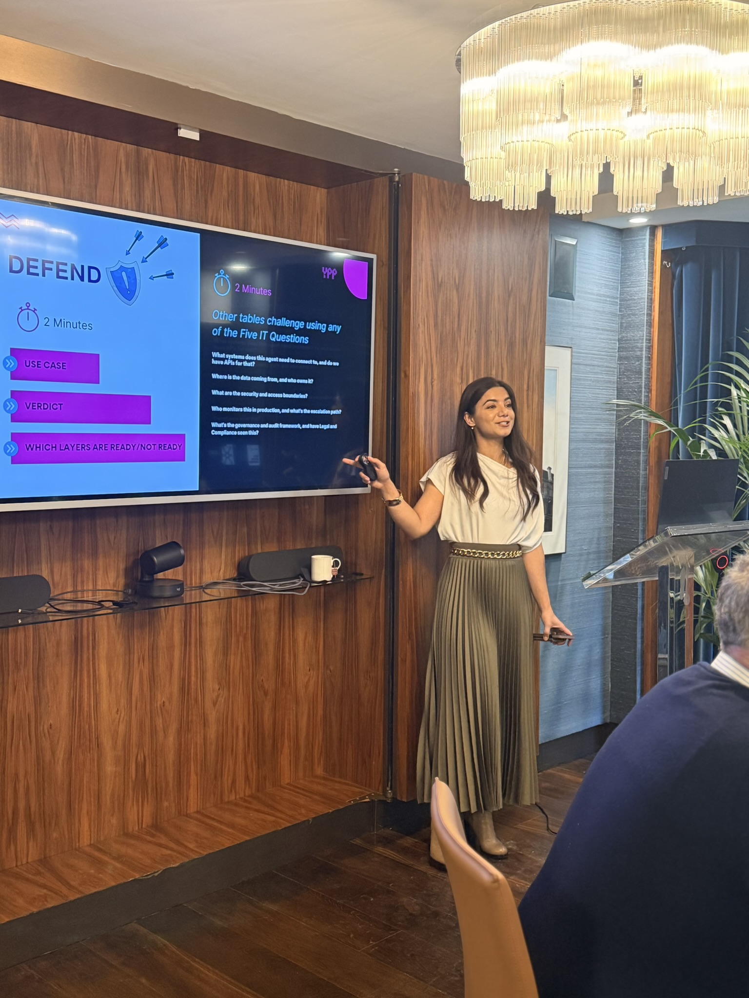 Khyati Pal leading an interactive workshop about evaluating AI agent use cases